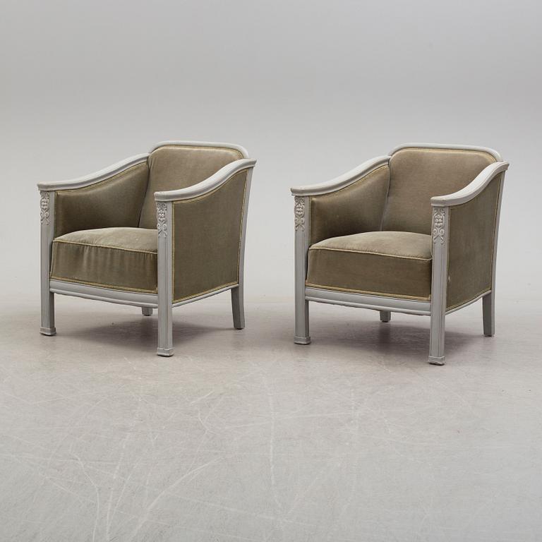 A pair of early 20th century easy chairs.