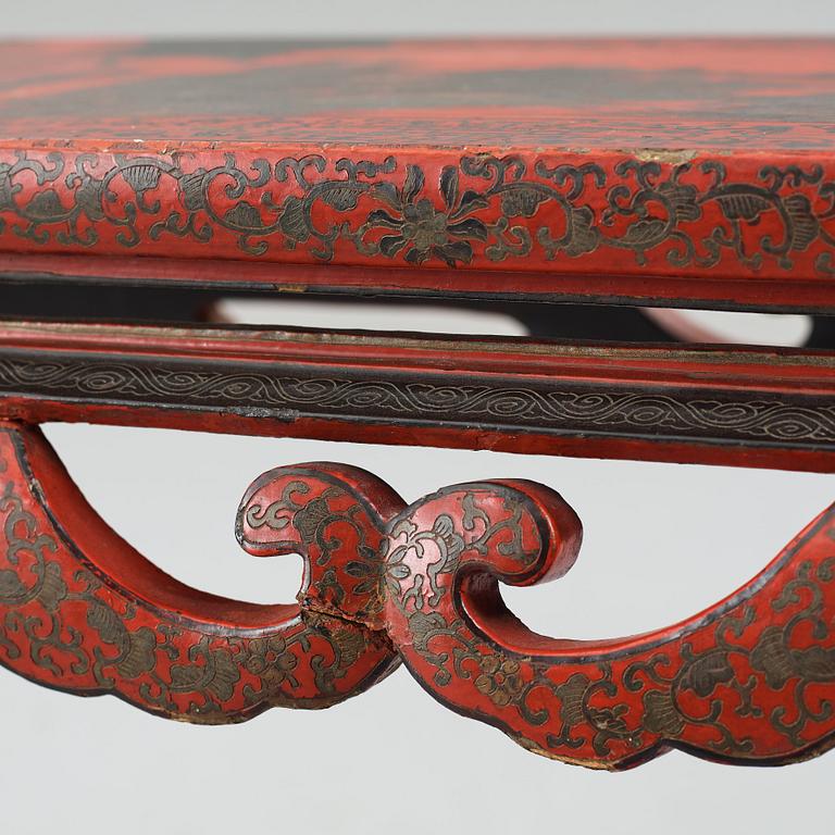 A Chinese lacquered table, Qing dynasty (1664-1912).