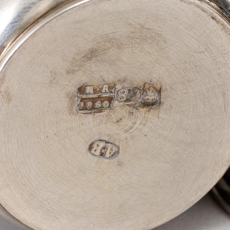 A set of four Russian 19th century silver and niello vodka cups, Moscow.