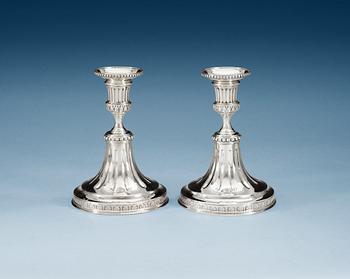 722. A pair of Swedish 18th century silver candlesticks, makers mark of Pehr Zethelius, Stockholm 1783.