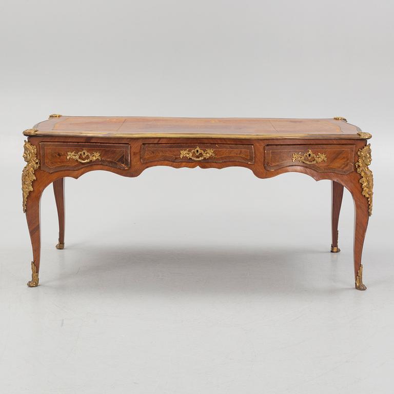 A French Louis XV-style rosewood marquetry 'Bureau plat aux bustes de femmes", late 19th century.