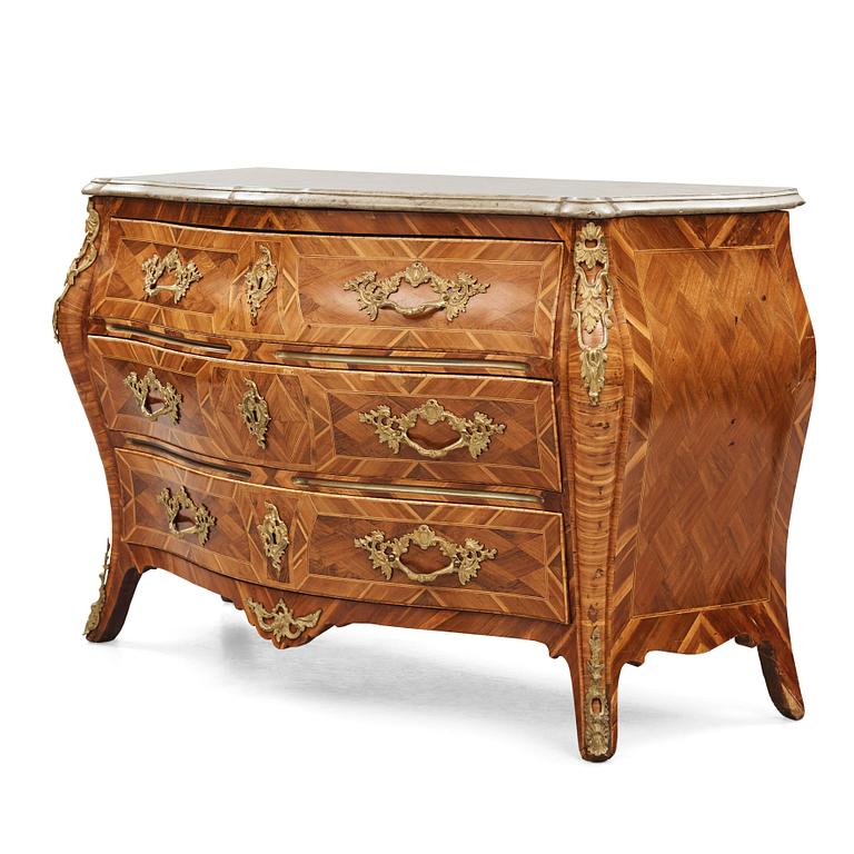 A rococo  gilt-brass mounted and rosewood parquetry commode by J. H. Reimers (master in Stockholm 1754-73).