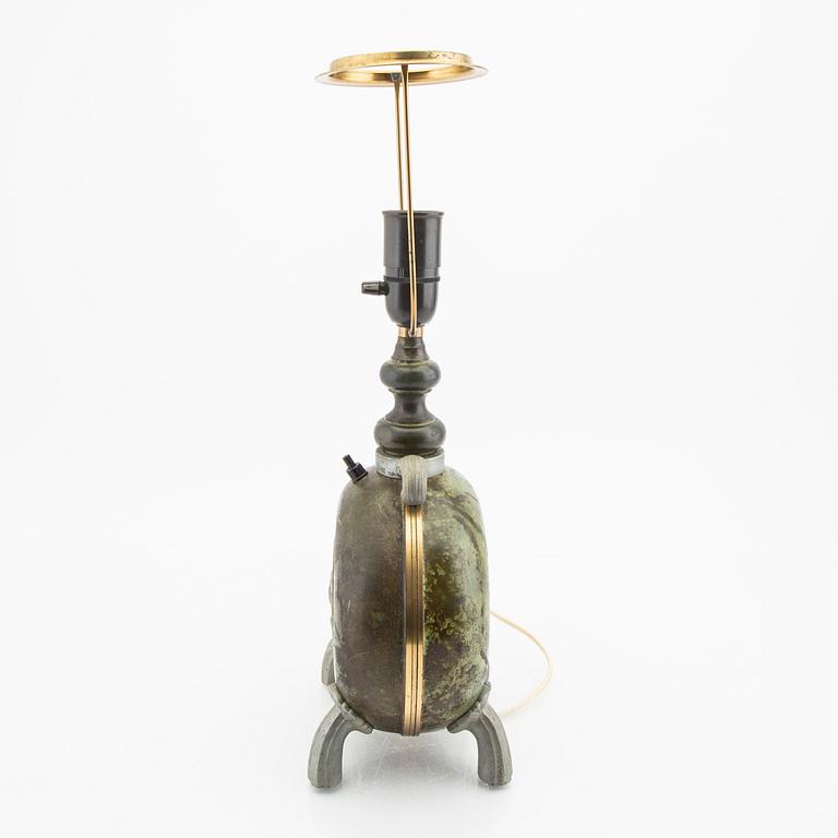 A 1940s metal table lamp.