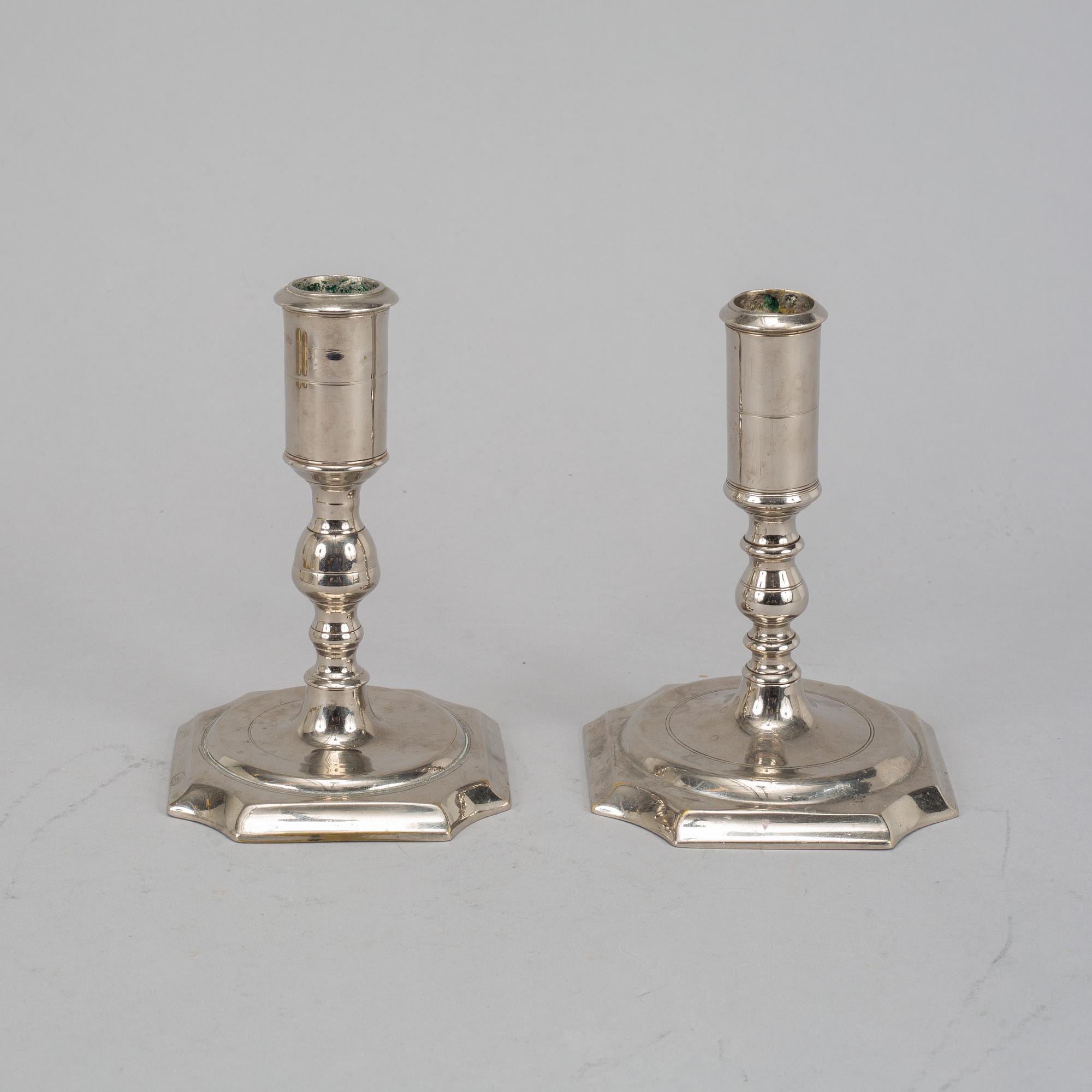 Two Swedish 18th century candlesticks.