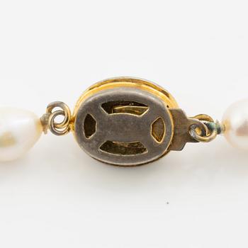 Collier och armband odlade pärlor med silverlås.