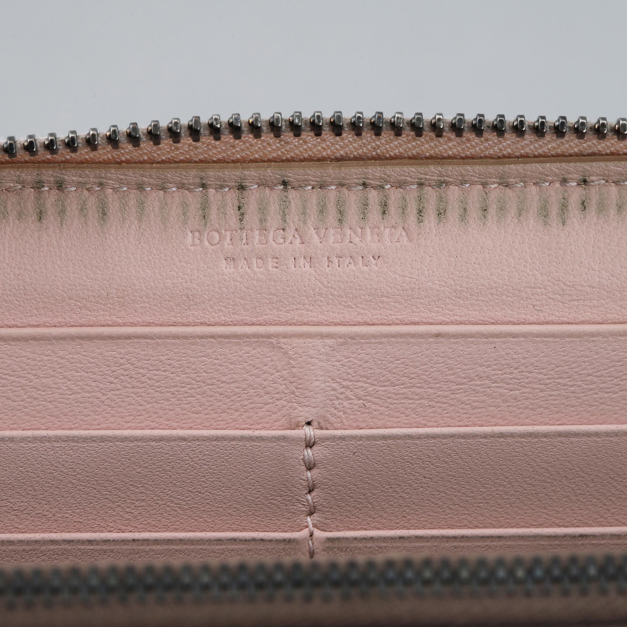 BOTTEGA VENETA, a intrecciato leather wallet.