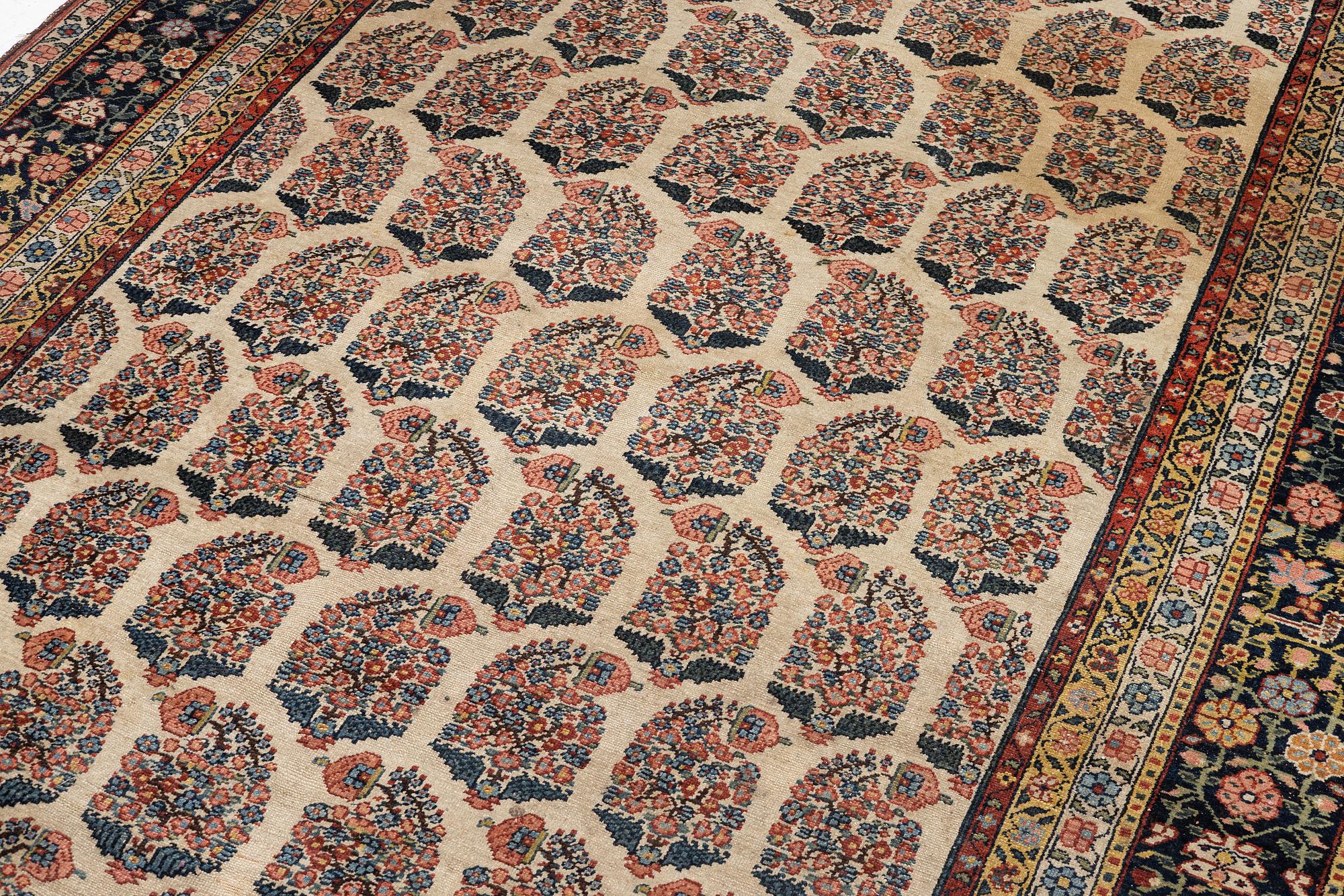 A Bakhtiari carpet, signed, c. 580 x 212 cm.