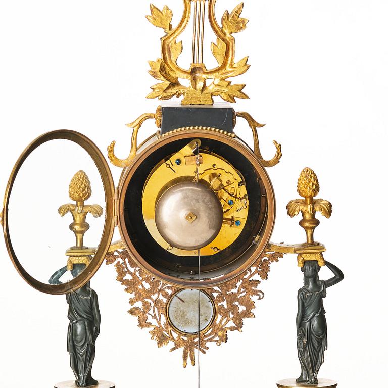 A late Gustavian marble and ormolu portico mantel clock, late 18th century.