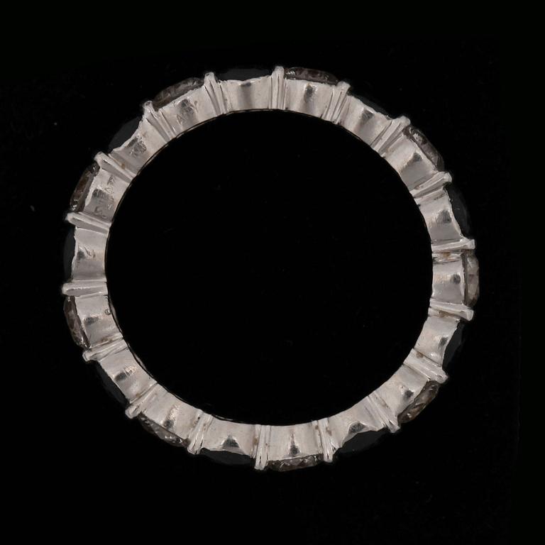 A Tiffany & Co ring with sapphires and brilliant cut diamonds.