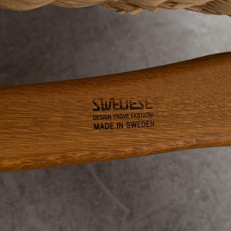 Yngve Ekström, fåtölj samt fotpall, ”Lamino”, Swedese.