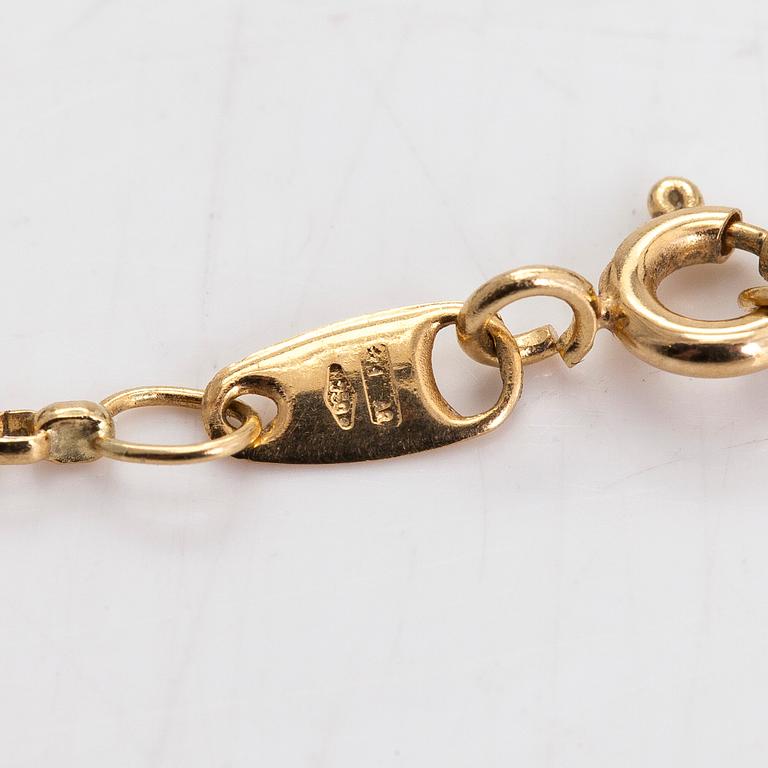 Halsband/hänge, 18K guld och rubiner.  Kedjan stämplad Unoaerre, Italien.