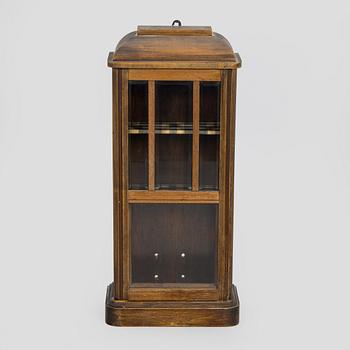 Wall-mounted cabinet / telephone cabinet, early 20th century.
