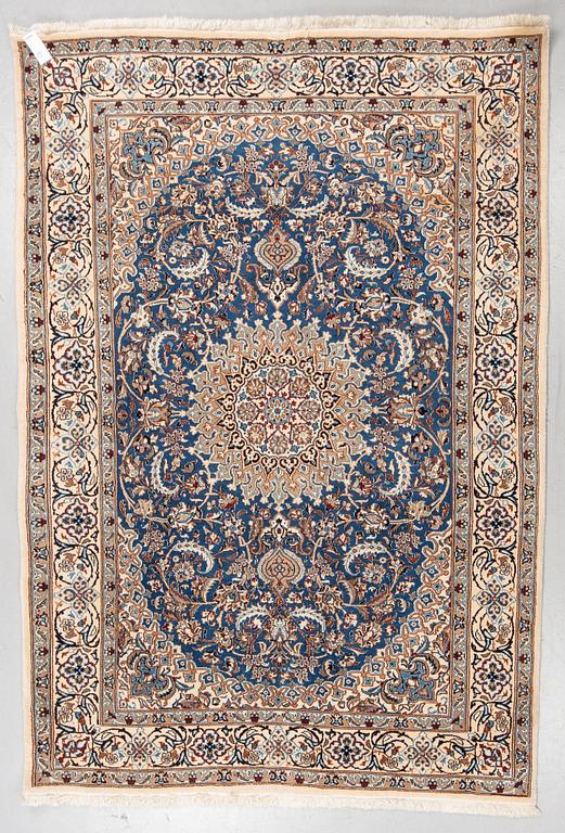 A carpet, Old Nain, part silk, ca 285 x 198 cm.