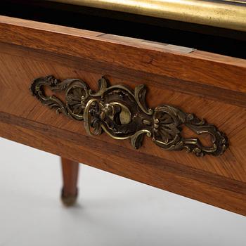 A French Louis XV-style parquetry and gilt bronze-mounted 'bureau plat', late 19th century.