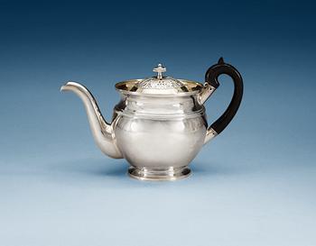 A Russian 20th century parcel-gilt tea-pot, un identified makers mark, S.t Petersburg.
