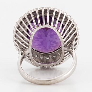 RING, 18K white gold with a large amethyst and small diamonds ca 0.65 cts.