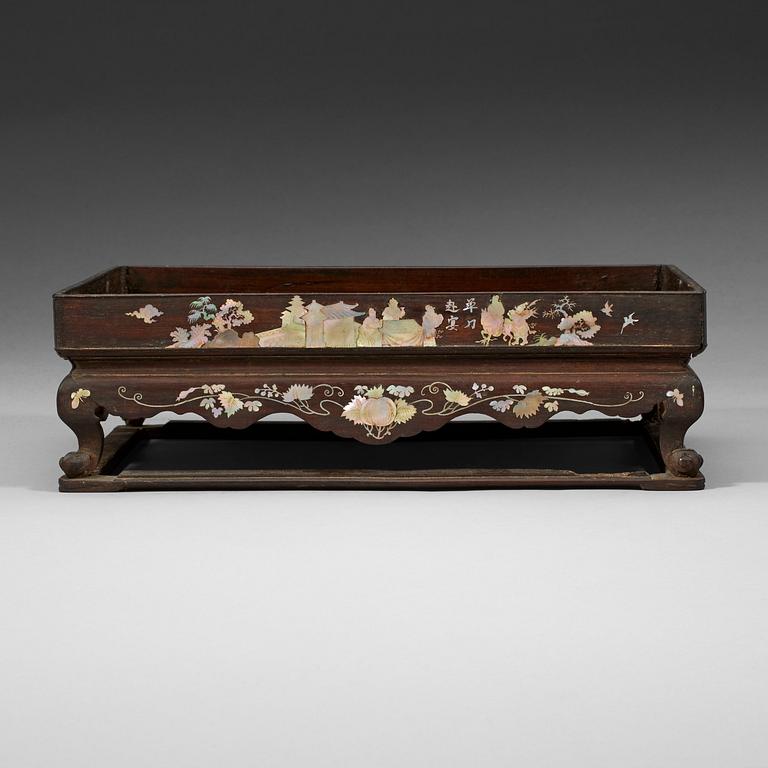 A wooden opium tray with inlays of mother-of-pearl, Qing dynasty, 19th Century.