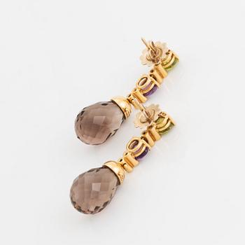 A pair of 18K gold earrings with briolette-cut smoky quartz, peridot, amethyst.