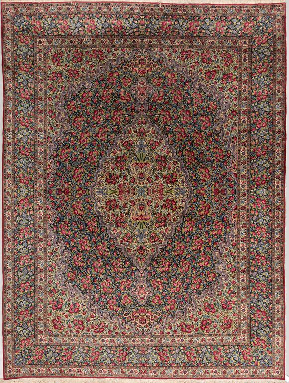 A semi-antique Kerman, around 351 x 269 cm.