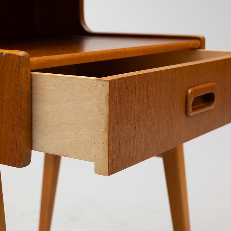 A pair of bedside tables, 1950s.
