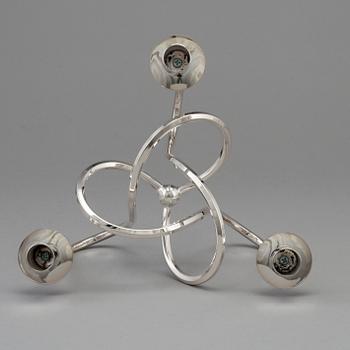 a silver platen "Vänskapsknuten" candelabra, Firma Svenskt Tenn, designed in 1938,