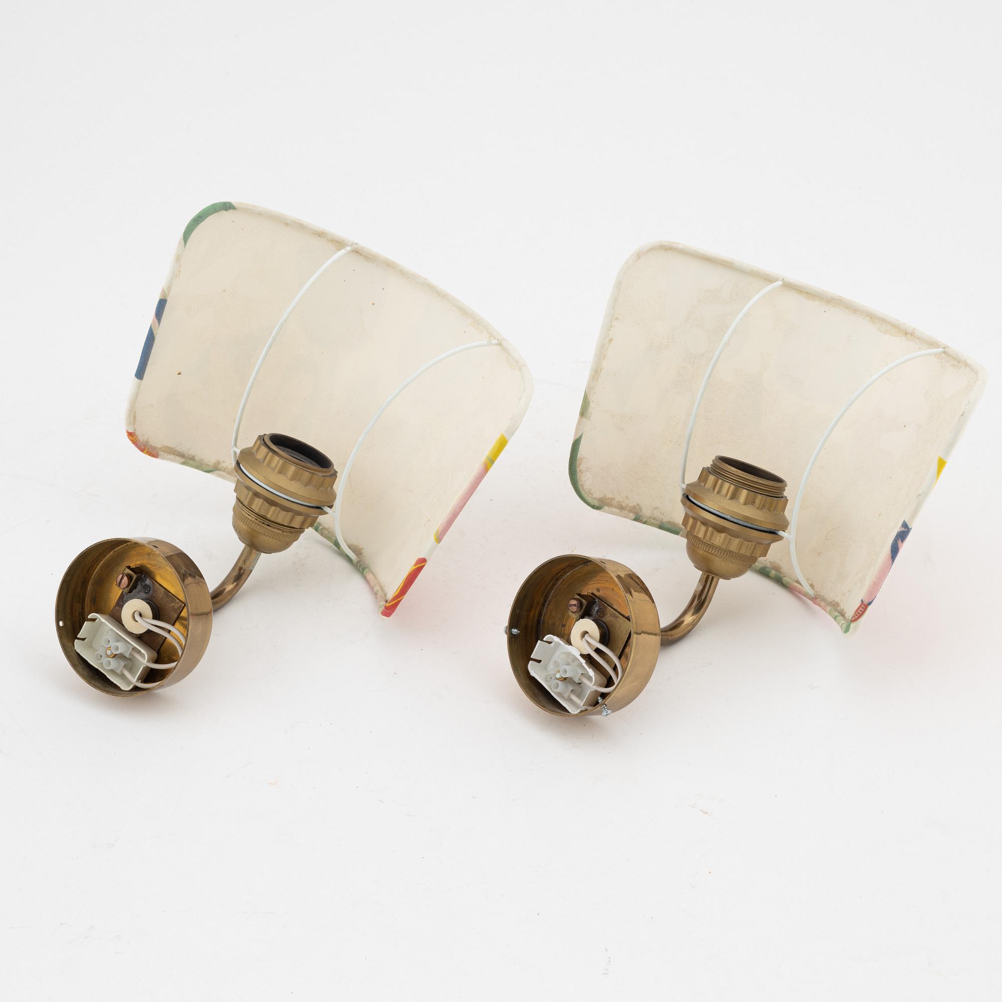 Josef Frank, a pair of model '2143' brass wall lamps, Firma Svenskt Tenn.