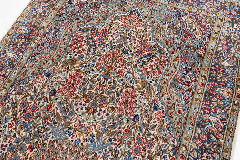 Carpet, Kirman, antique, approx. 242 x 146 cm.