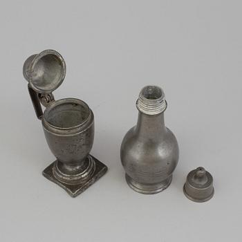 A PEWTER MUSTARD POT AND FLASK, 18th-19th century.