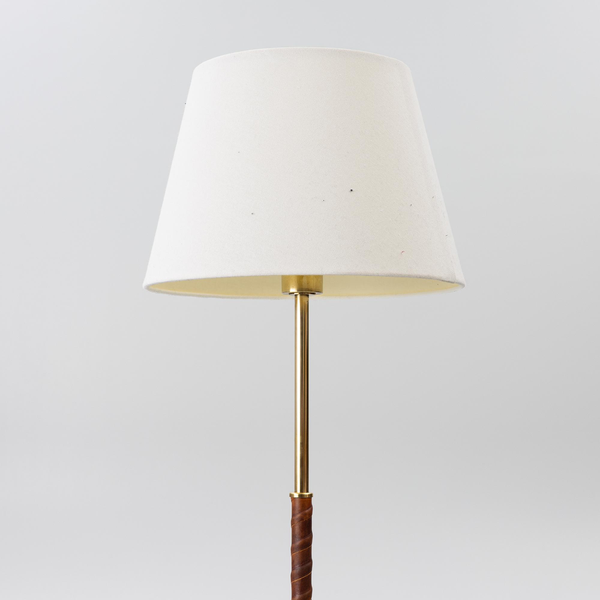 Harald Notini, or Uno Westerberg, a brass floor lamp, model 15750, Arvid Böhlmarks Lamp Factory, Stockholm, 1950s.
