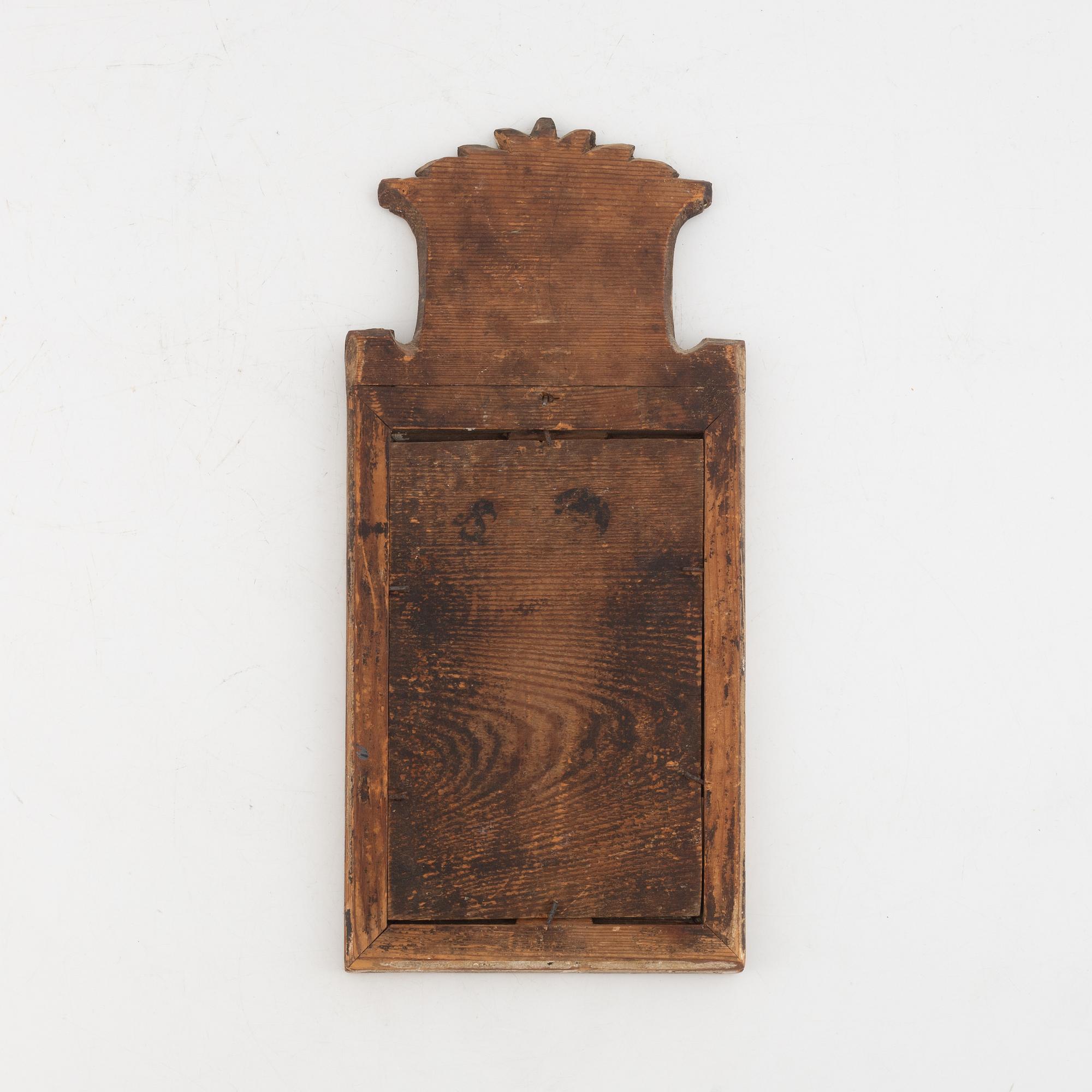 A Gustavian giltwood toilette-mirror by A Carlsson (master in Norrköping 1772-1801).