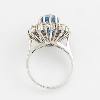 Sapphire and brilliant cut diamond cluster ring.