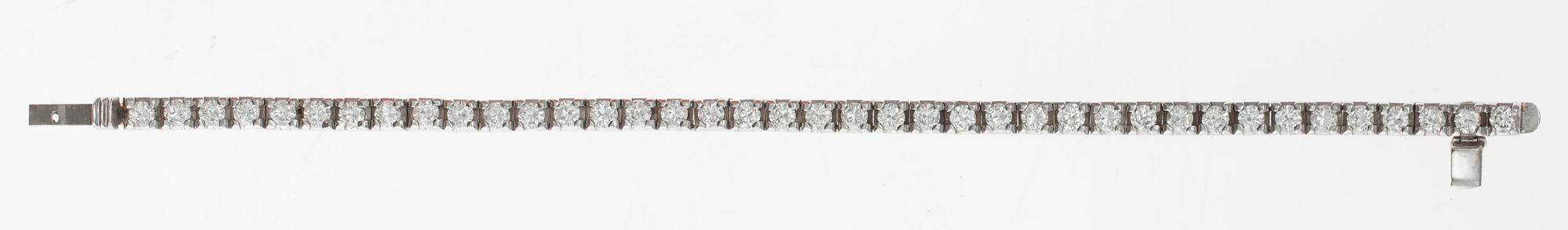 ARMBAND, 18K vitguld. Briljantslipade diamanter ca 5.50 ct. H/vs. Sverige 1969. Längd 18 cm. Vikt 26,2 g.