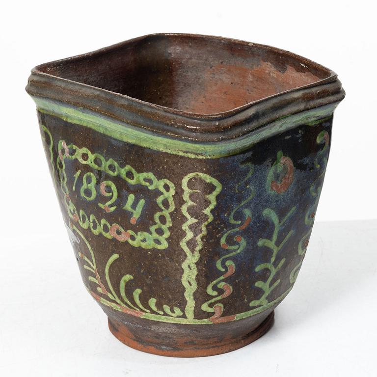 Stoneware planter and stand, dated 1824.