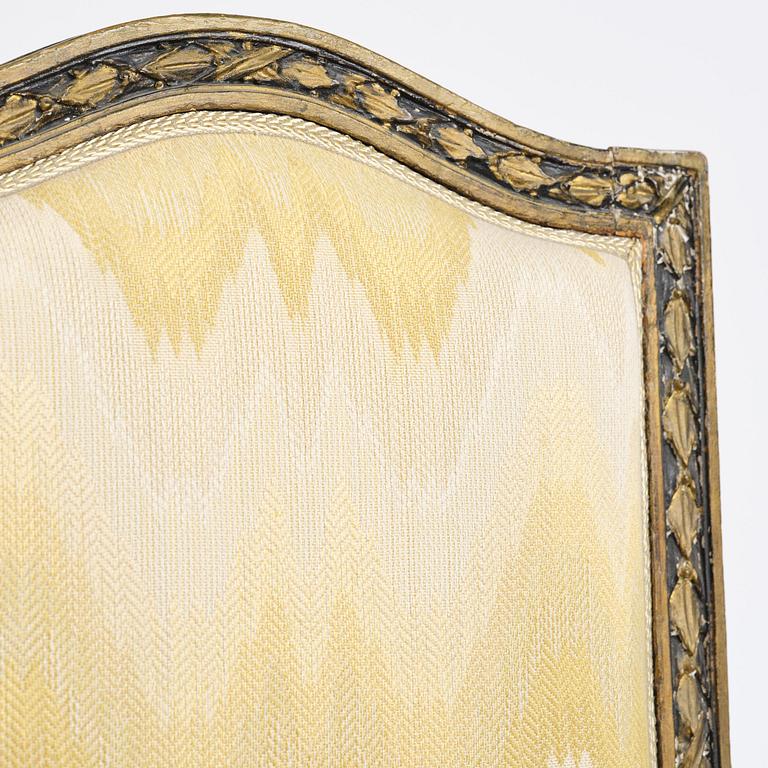 A French Louis XVI chair, late 18th century.