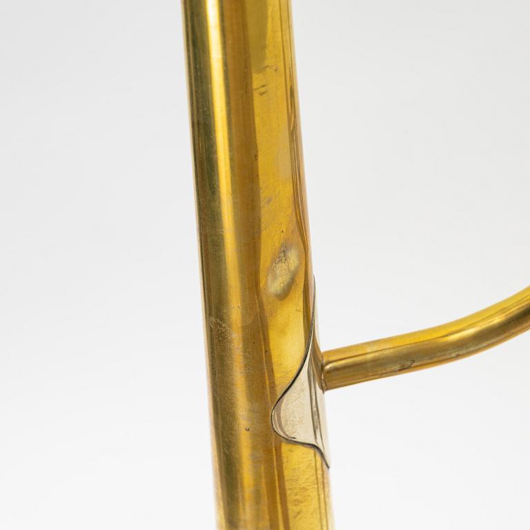 A valve trombone, 19th or early 20th Century.