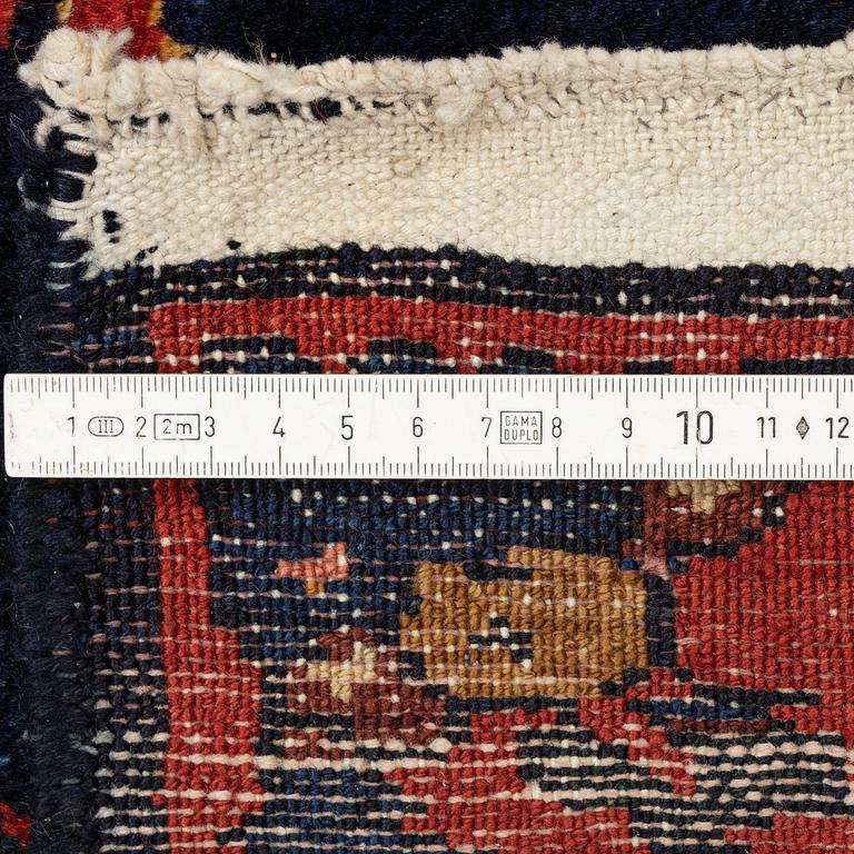 A semi-antique Khoigân village carpet, Feridan area, ca 314 x 209 cm.