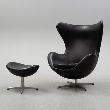 A "Egg chair" easy chair and ottoman, designed for Fritz Hansen, Denmark.
