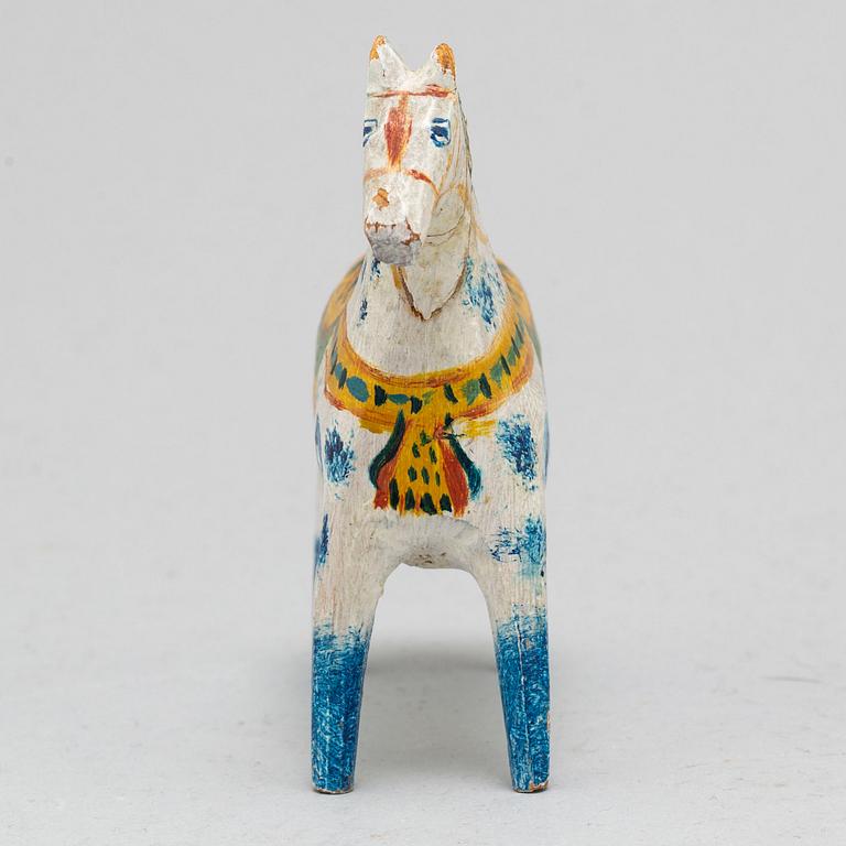 A painted Swedish wooden horse from the early 20th century.