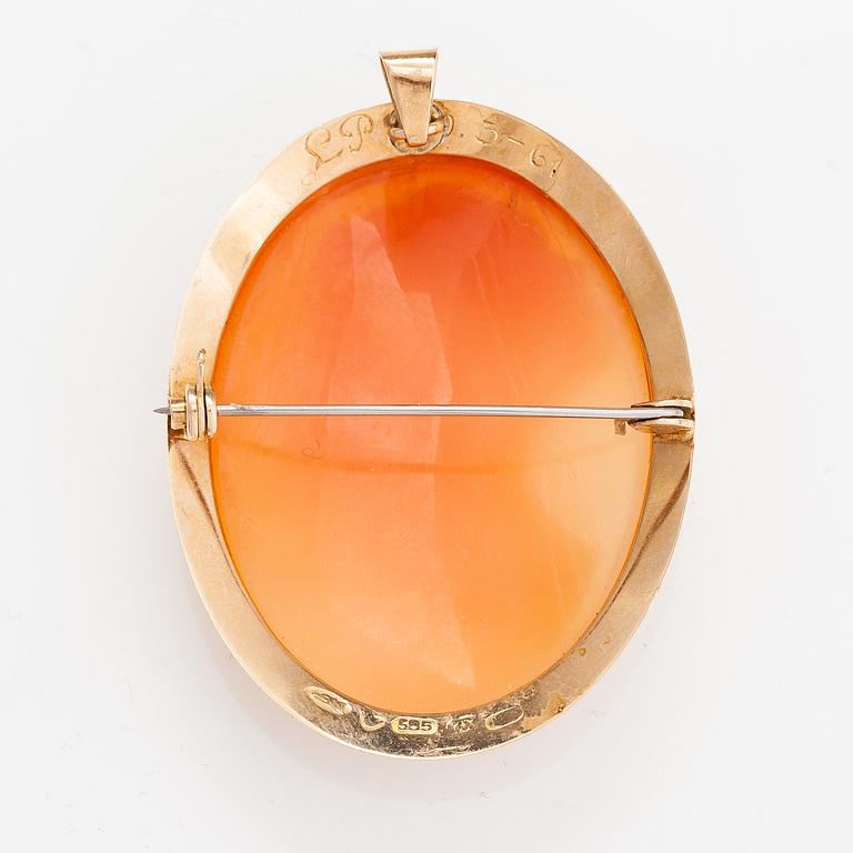 A 14K gold and seashell cameo brooch/pendant. Auran kultaseppä, Turku.