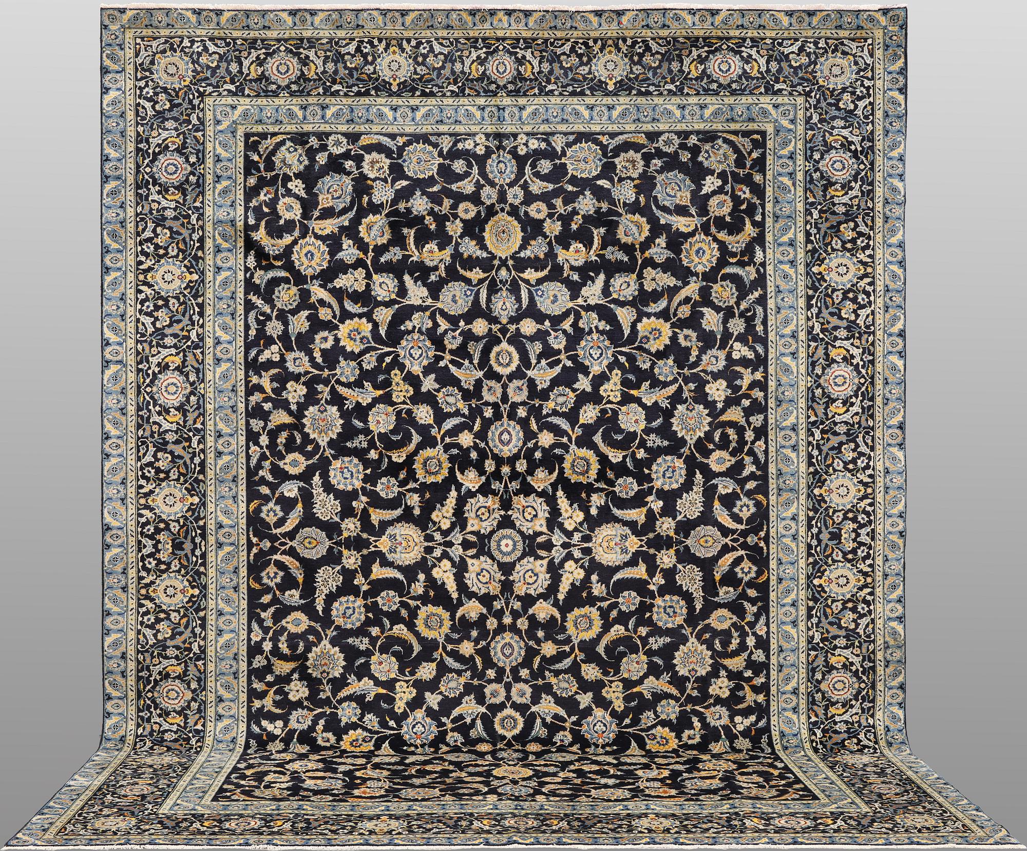 A Keshan carpet, c. 440 x 308 cm.