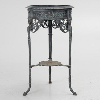 A plant stand, late 20th century.