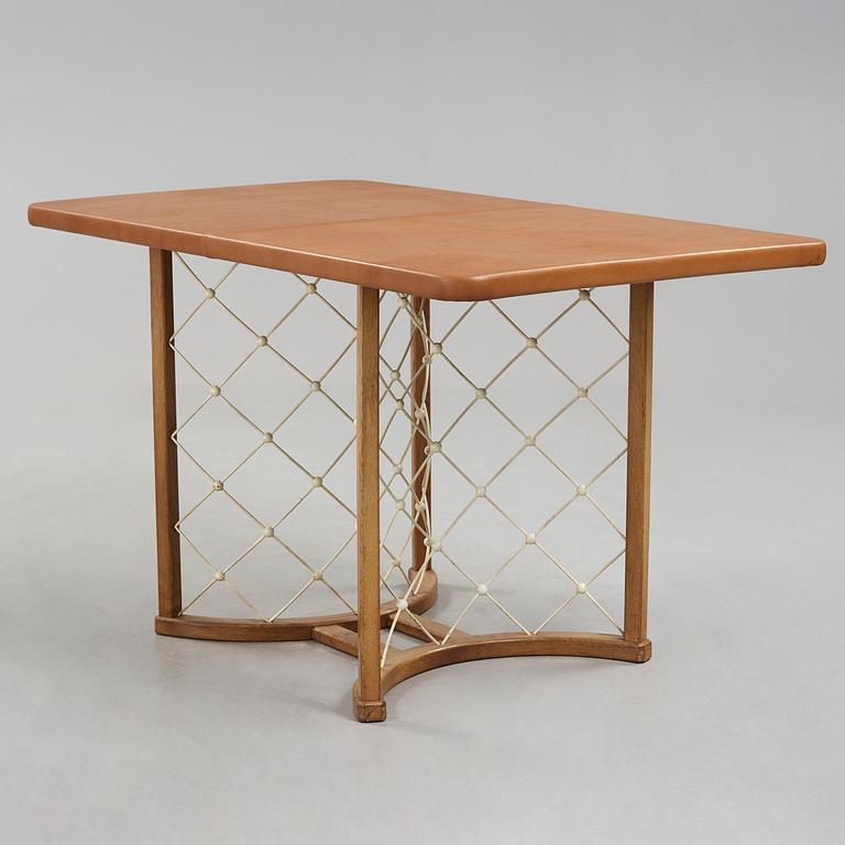 A modernist oak based table, 1940-50's.
