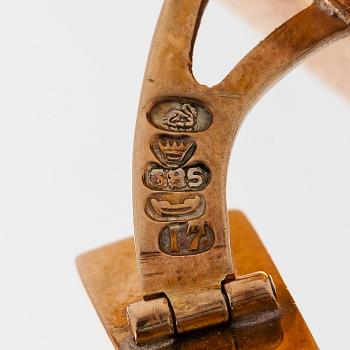 Kalvosinnapit, 14K kultaa ja hematiitit, Kaisaniemen Kello ja Kulta 1962.