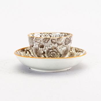 A Chinese 18th century porcelain teacup and saucer.