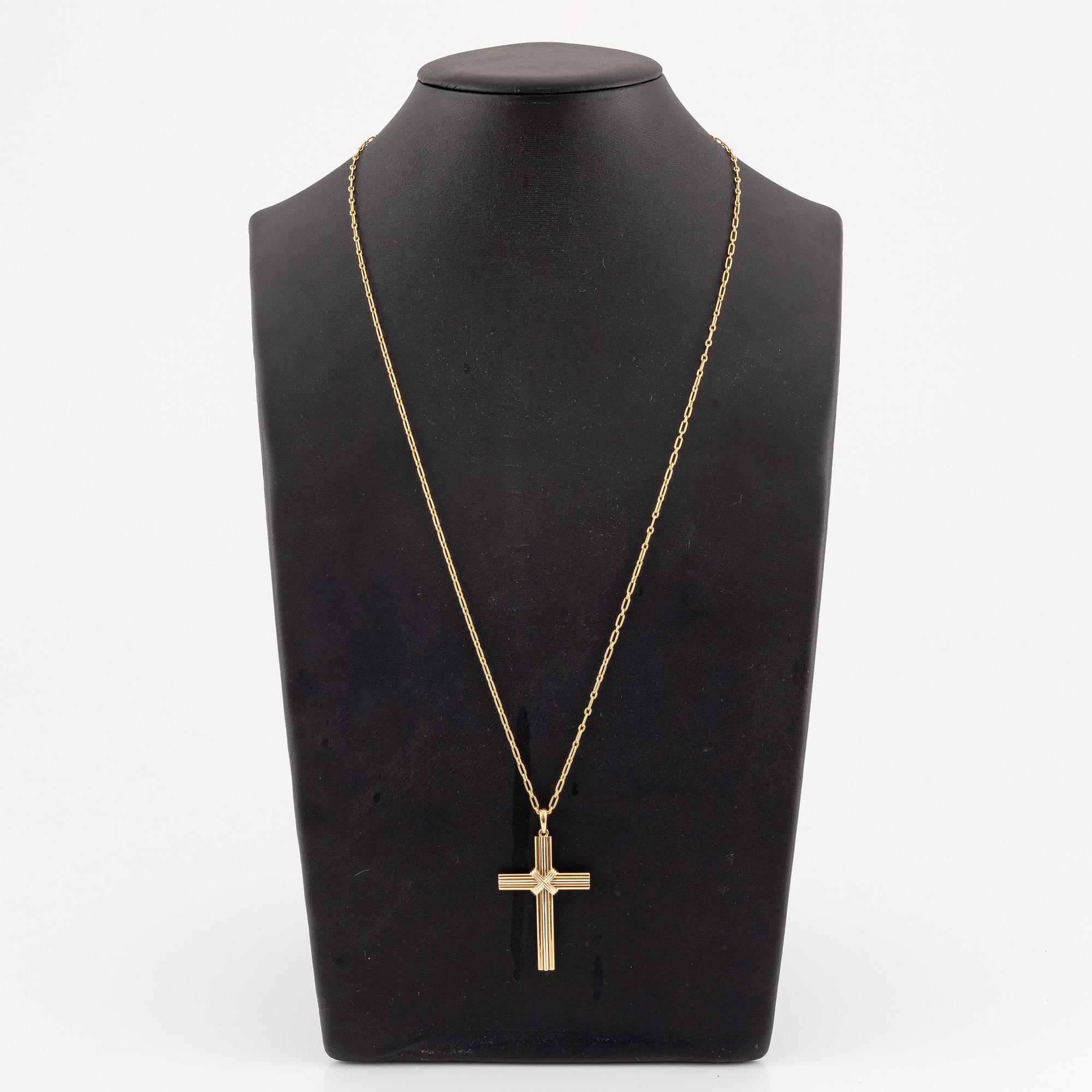 A Cartier necklace 18K multi-coloured gold "Trinity" cross.
