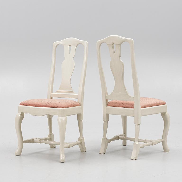 A Rococo style dining table and twelve chairs, KA Roos, Helsingborg, modern production.