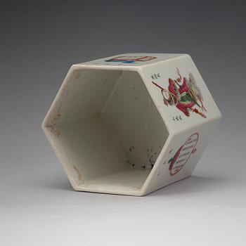 A famille rose hexagonal figure scene brushpot, Qing dynasty, 19th Century.