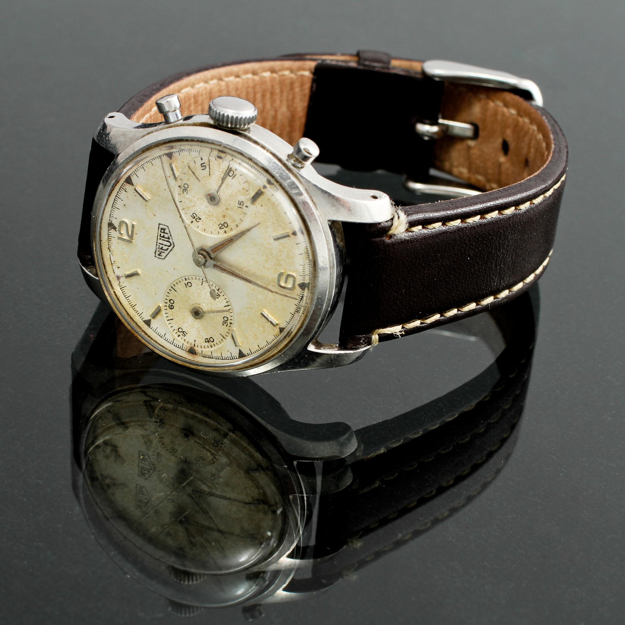 ARMBANDSUR, stål, herr, Heuer, omkring 1900-talets mitt.