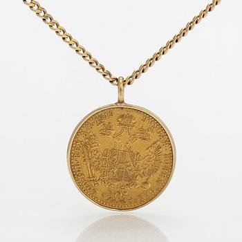 A gold coin pendant, Frans Josef I, Austria-Hungary, 1915. with a 14K gold chain.