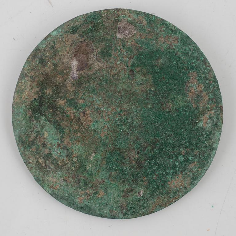 Speglar, fyra stycken, brons,  Handynastin (206 f.Kr.-220 e. Kr.).
